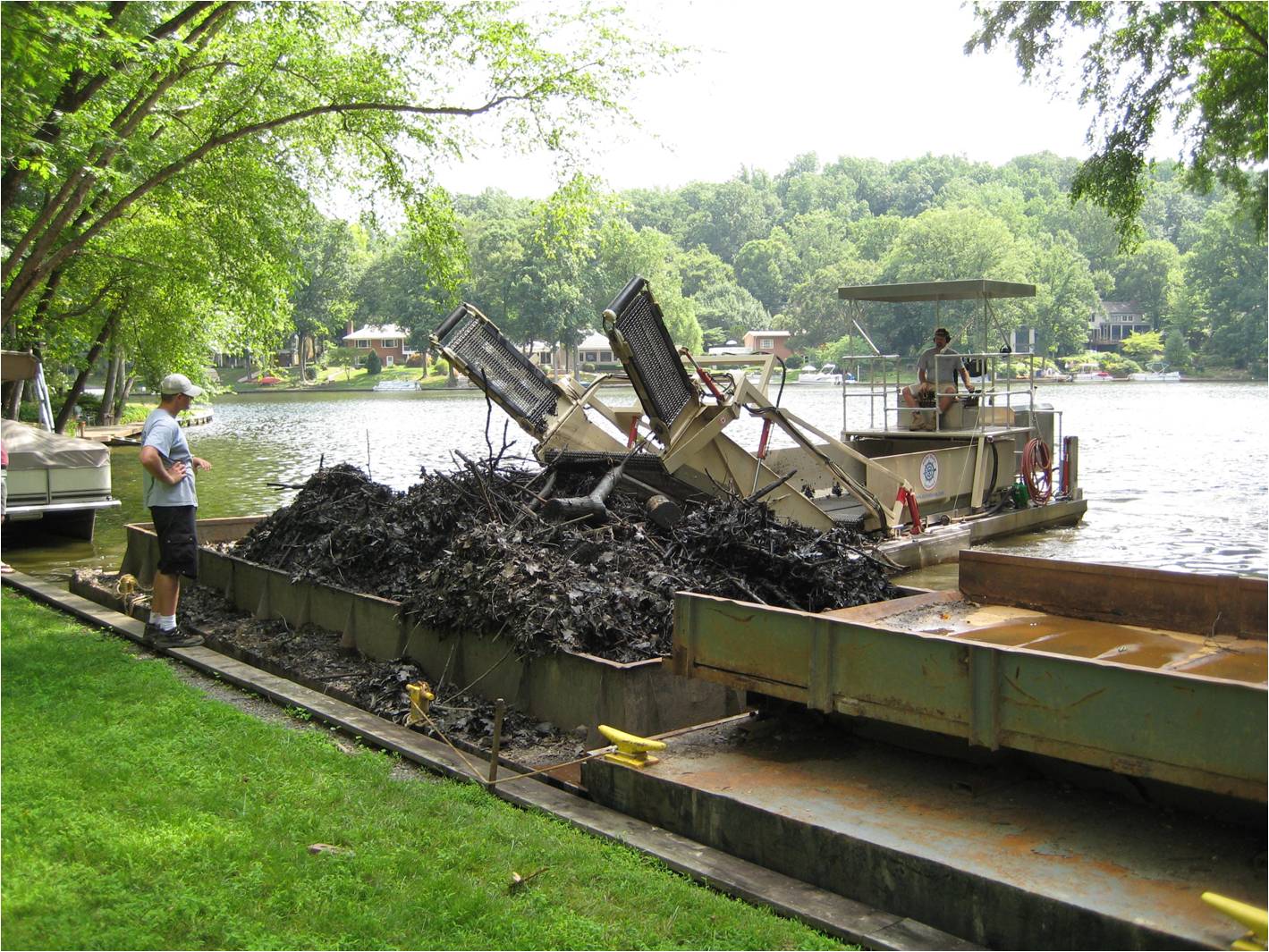 Trash skimmer removing debris